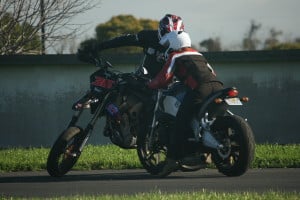 Coach Can instructing individual at his Cornering School Days